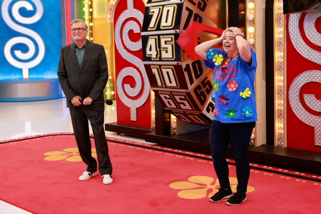 Drew Carey with a contestant on "The Price Is Right." There are certain things he's not allowed to tell players during the game.