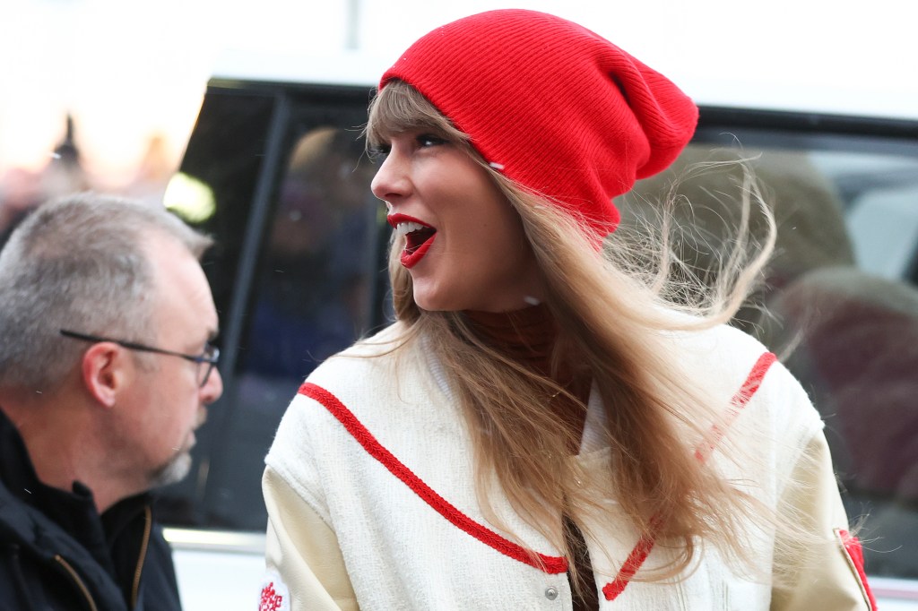 The pop superstar wore a red cap and a cozy jacket.