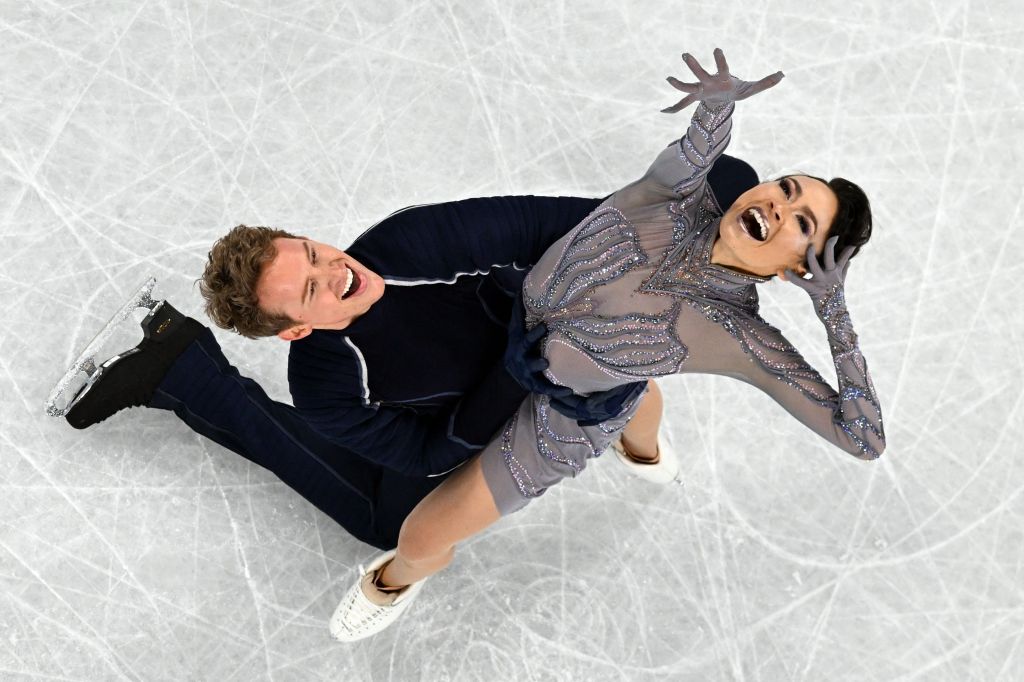 USA's Madison Chock and USA's Evan Bates compete in the ice dance free dance of the figure skating event during the Beijing 2022 Winter Olympic Games