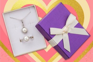 Valentine's Day jewelry in purple box with white bow, contains a necklace.