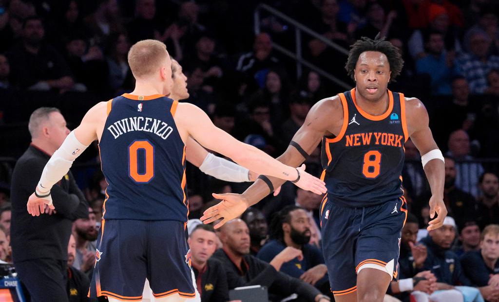 New York Knicks forward OG Anunoby #8 greeted by New York Knicks guard Donte DiVincenzo #0 during the third quarter of Denver Nuggets vs. New York Knicks game