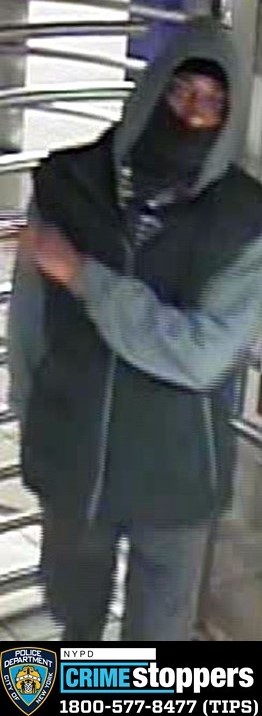 The suspect in the Queens Plaza unprovoked subway slashing is pictured near the turnstile area.