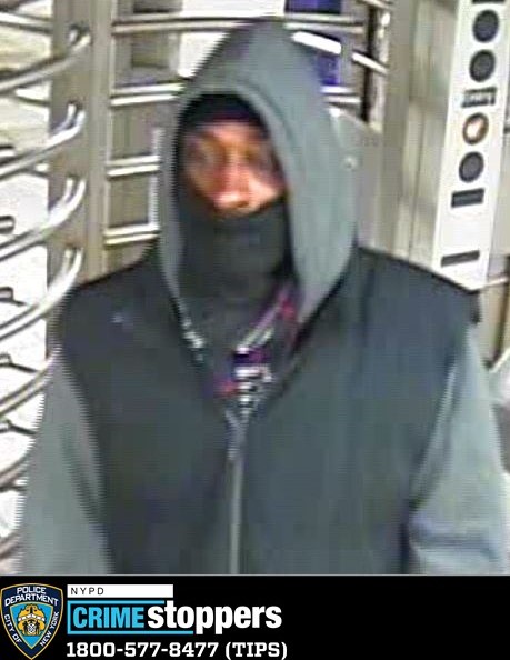 The suspect in the Queens Plaza unprovoked subway slashing is pictured near the turnstile area.