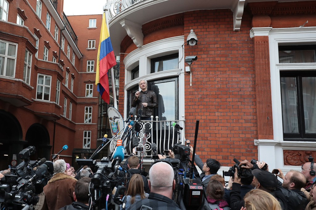 Julian Assange speaks to the media from the balcony of the Embassy Of Ecuador on May 19, 2017 in London, England.  
