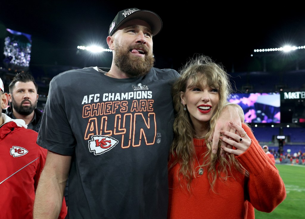 Travis Kelce #87 of the Kansas City Chiefs celebrates with Taylor Swift after a 17-10 victory against the Baltimore Ravens in the AFC Championship Game at M&T Bank Stadium on January 28, 2024 in Baltimore, Maryland.  