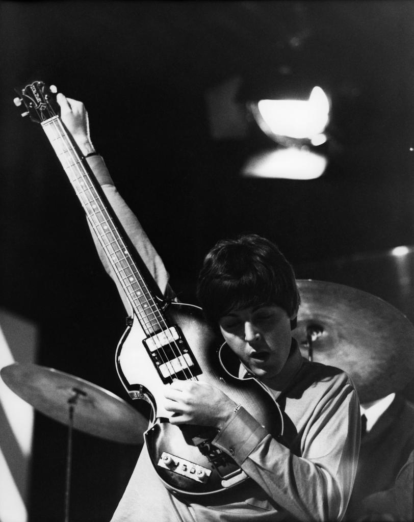 Paul McCartney playing his Hofner 500/1 violin bass guitar during rehearsals for Thank Your Lucky Stars Summer Spin, London, 11th July 1964.