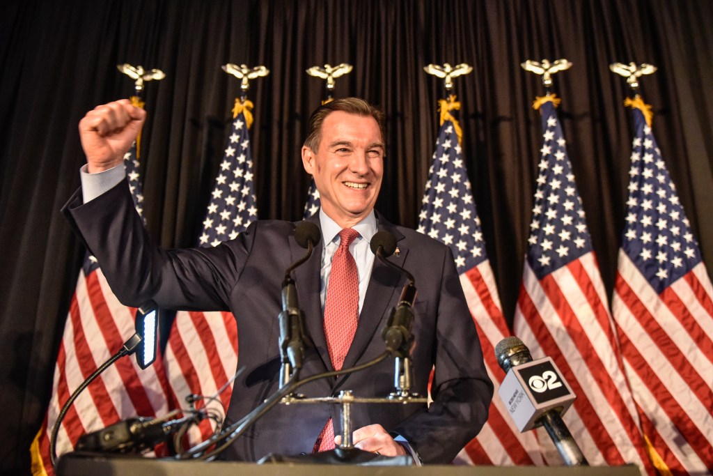 Tom Suozzi celebrates his victory in the special election to replace Republican Rep. George Santos on Feb. 13, 2024 in Woodbury, New York. 