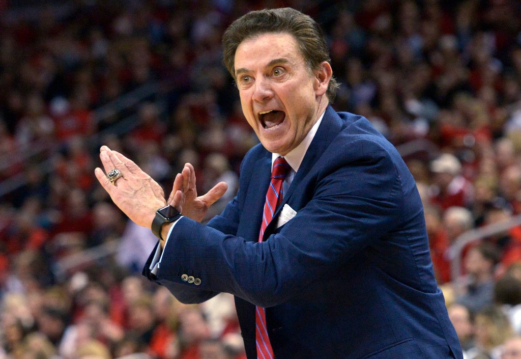 Rick Pitino yelling from the sidelines of a basketball game.