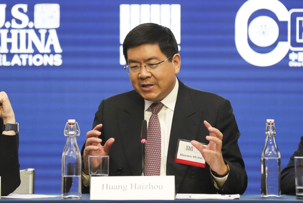 Huang Haizhou, speaking at a podium during 'Forecast: China's Economy' event in New York, USA on 09 Jan 2018.