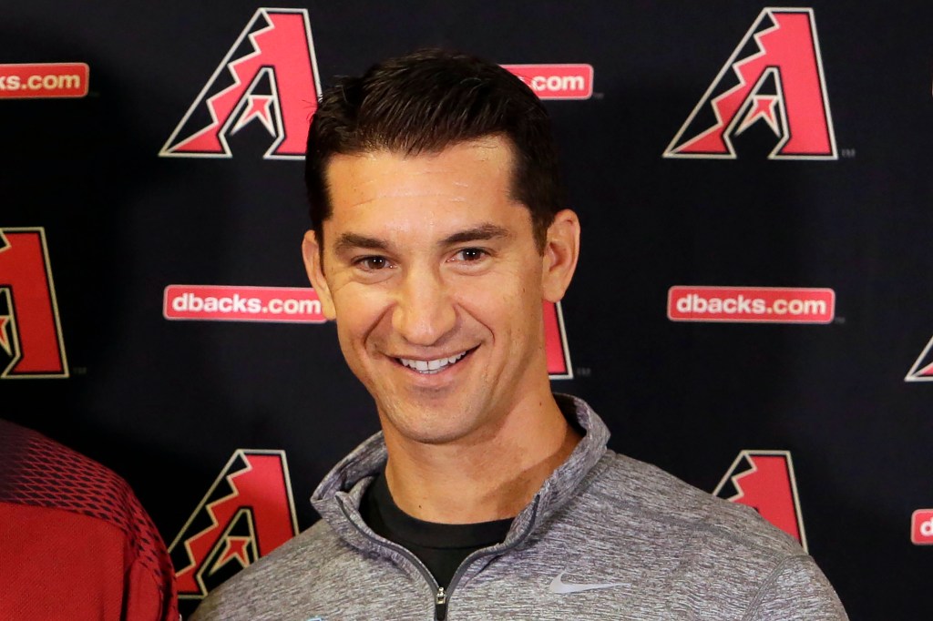 Diamondbacks general manager Mike Hazen smiles during a press conference