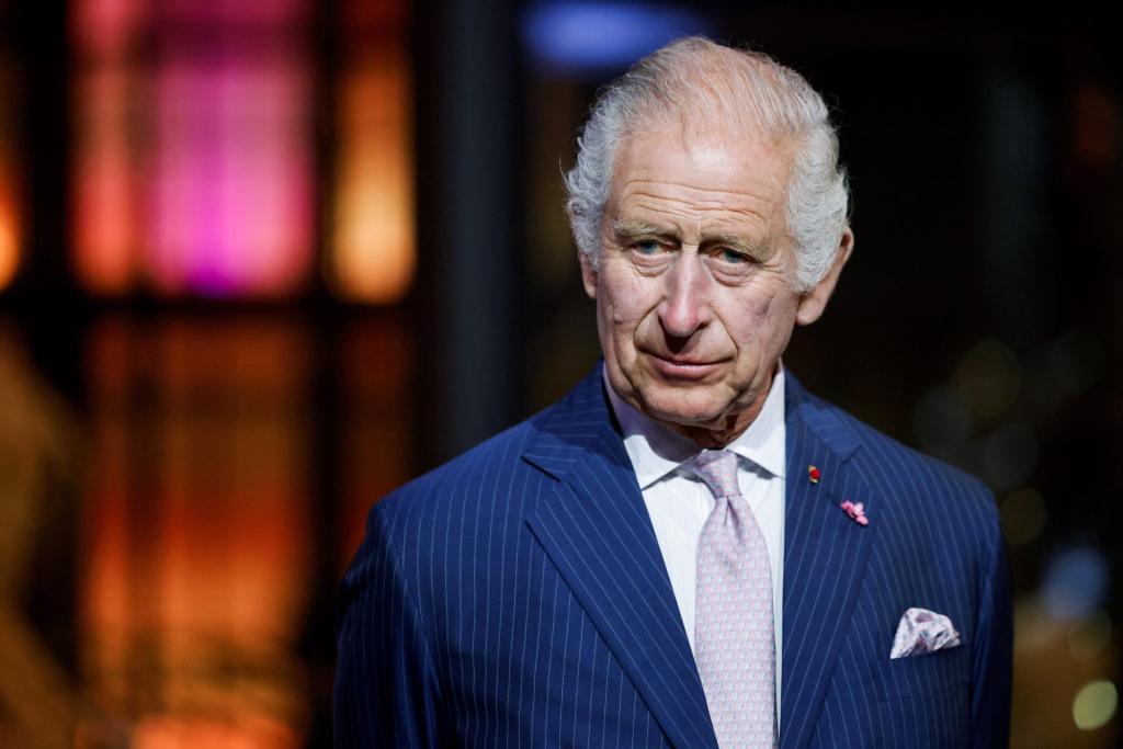 King Charles III in a suit during his visit to the Museum of Natural History in Paris, Sept. 21, 2023. (Photo by Ludovic Marin, Pool via AP)