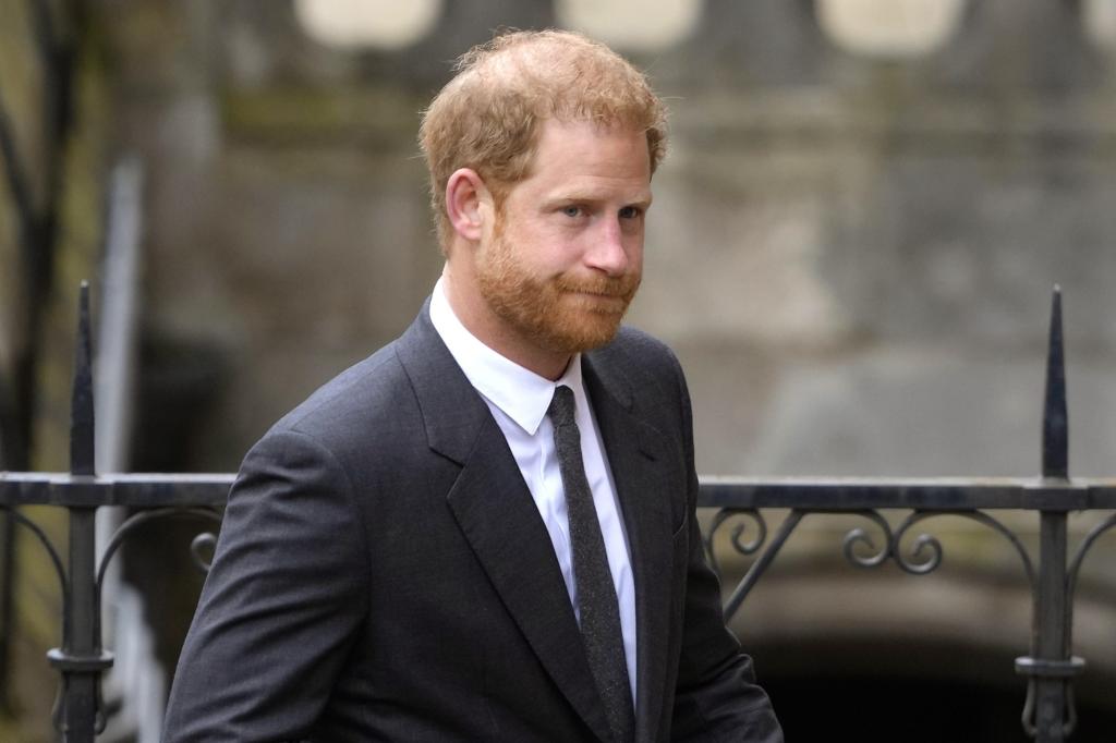 Prince Harry, Duke of Sussex, arrives at the Royal Courts Of Justice in London with a lawyer to challenge the government's denial of his request.