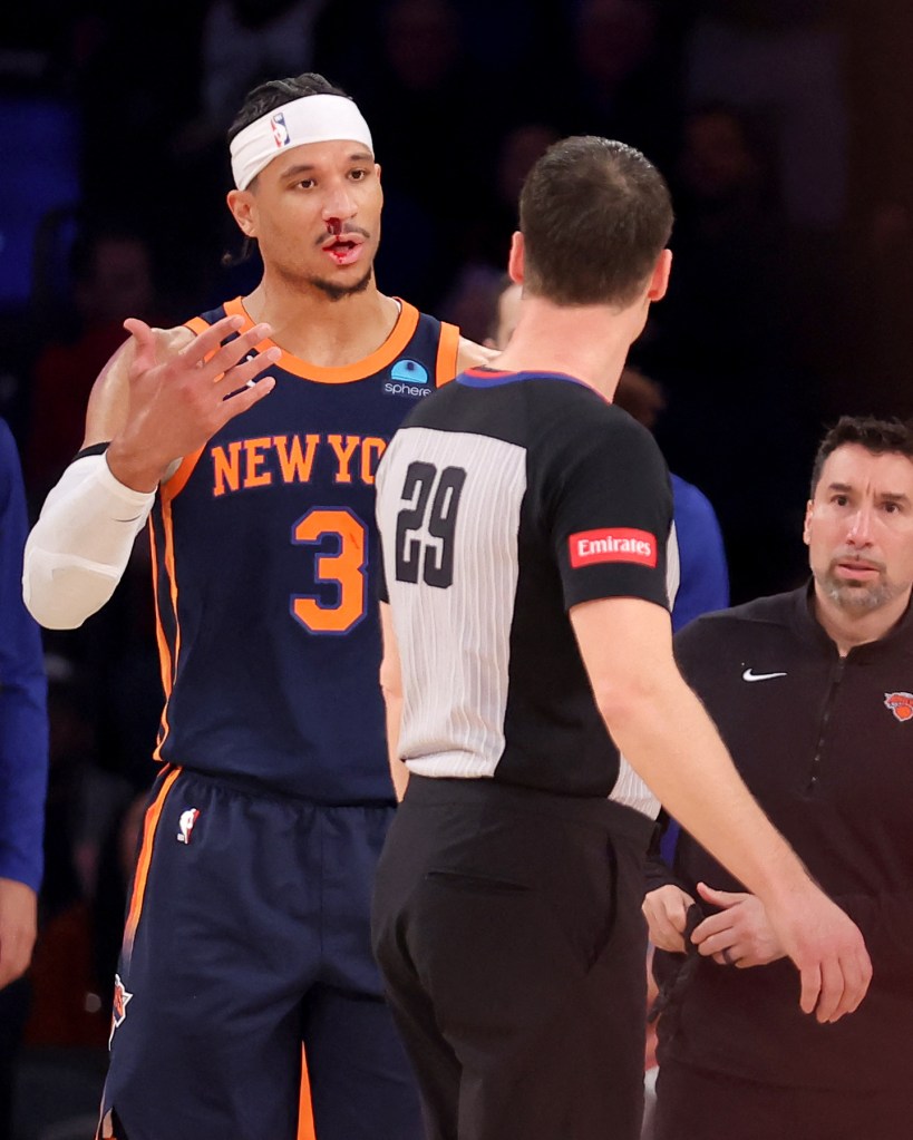 New York Knicks guard Josh Hart (3) argues with referee Mark Lindsay (29) after no foul was called on New Orleans Pelicans forward Zion Williamson (not pictured) on a play that resulted in Hart's bloody nose during the first quarter