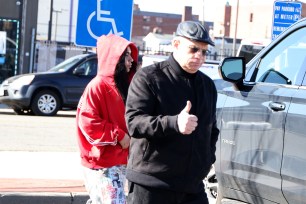 John “Junior” Gotti leaves court with his wife and daughter, who were charged with assault following a violent brawl at a Long Island high school.