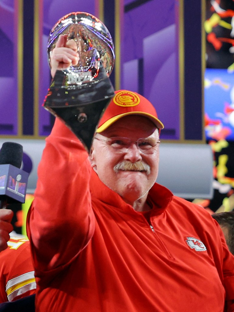Andy Reid hoists the Lombardi trophy after winning Super Bowl 2024. 