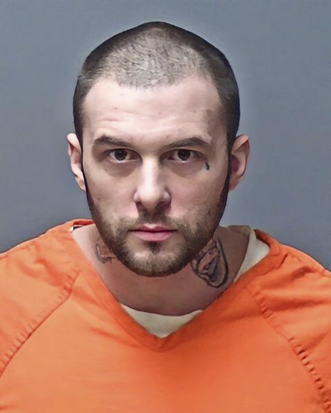 This undated booking photo provided by the Manchester Police Department shows Adam Montgomery