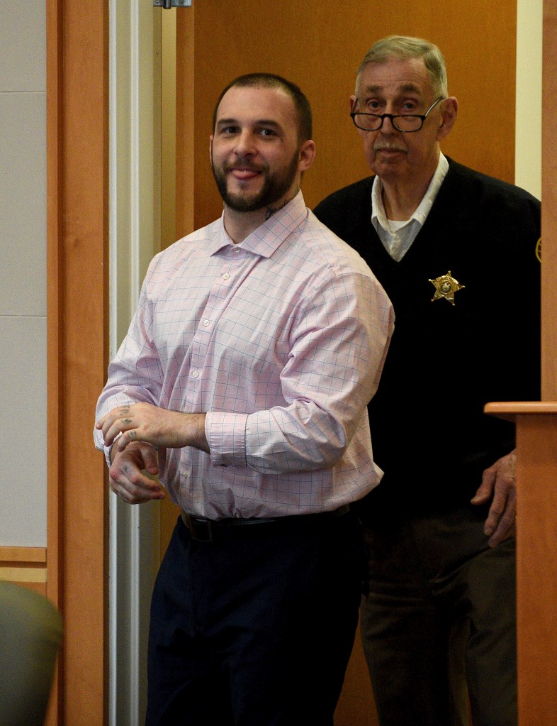 Adam Montgomery enters the courtroom for jury selection ahead of his murder trial at Hillsborough County Superior Court in Manchester, N.H, on Tuesday, Feb. 6, 2024