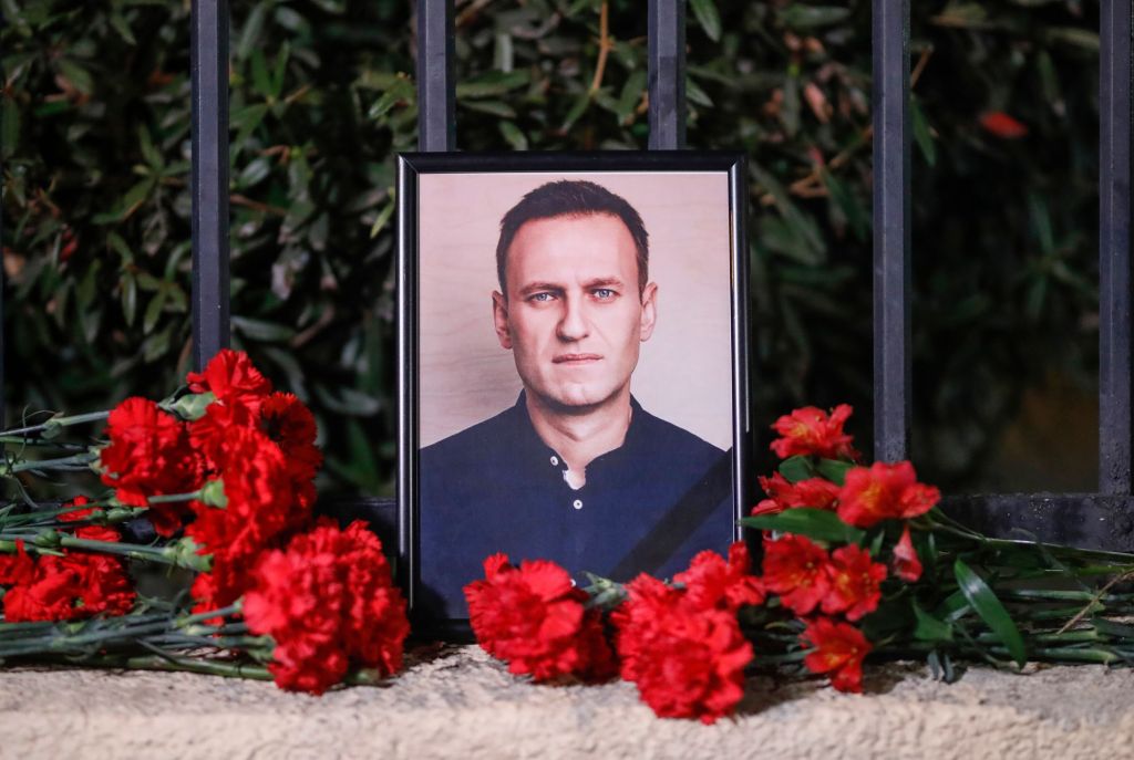 Flowers lay near a portrait of Russian late opposition leader Alexei Navalny in front of the Russian embassy, in Tbilisi, Georgia