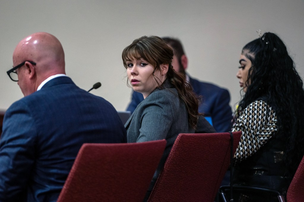 Hannah Gutierrez-Reed sits with her attorney Jason Bowles during the first day of trial in Santa Fe, New Mexico.