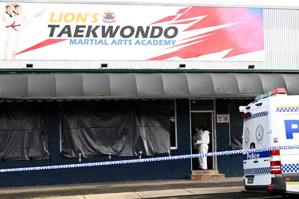 Police investigate at a crime scene in Sydney, Wednesday, Feb. 21, 2024. 