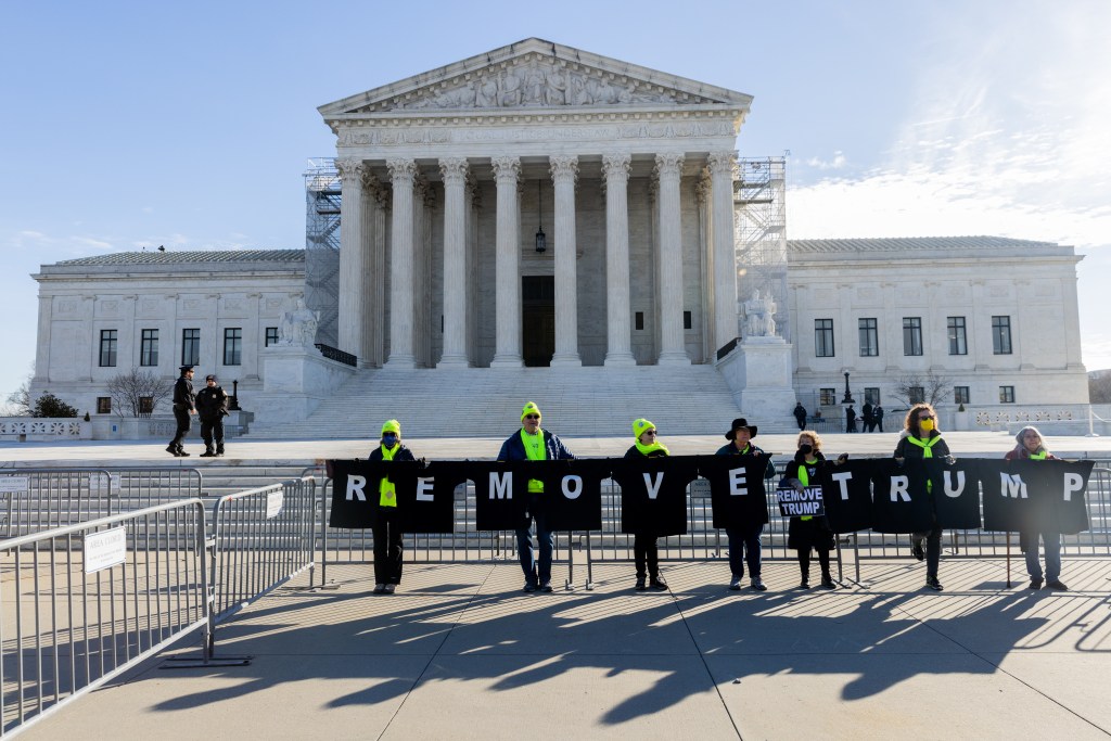 Protesters demonstrate outside of the U.S. Supreme Court on February 8,