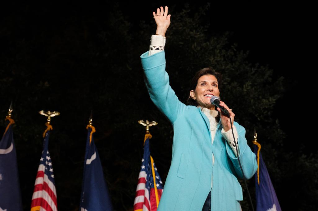 Nikki Haley waves to her supporters as she takes the stage during her campaign rally at New Realm Brewing in Charleston, South Carolina on Feb. 4, 2024.