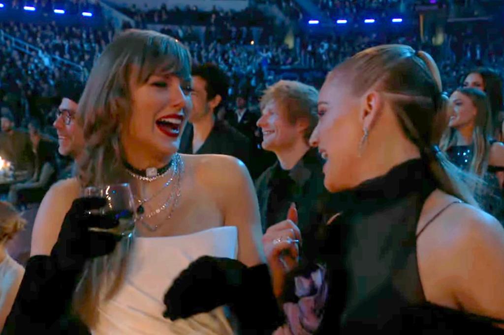 Swift, who donned her iconic red lipstick with a gorgeous white dress and black evening gloves, was spotted dancing with her friend Kelsea Ballerini who was sitting next to the "Midnights" songstress.