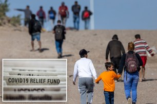 Immigrants from Venezuela walk towards a U.S. Border Patrol transit center after crossing the Rio Grande into the United States.