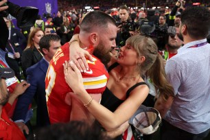Travis Kelce (L.) and Taylor Swift embrace after Super Bowl 2024. 