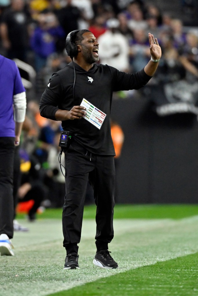 Daronte Jones shouts instructions during the Vikings-Raiders game on Dec. 10, 2023.