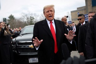 Donald Trump speaking at a polling station during New Hampshire presidential primary in Londonderry.