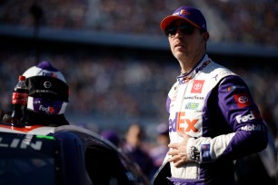 Denny Hamlin, driver of the #11 FedEx Toyota, waits on the grid prior to the NASCAR Cup Series Daytona 500.