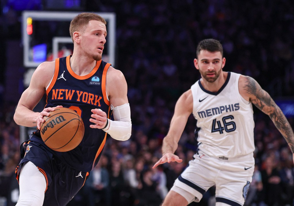 Donte DiVincenzo, who scored a game-high 32 points, drives on John Konchar during the Knicks' win.