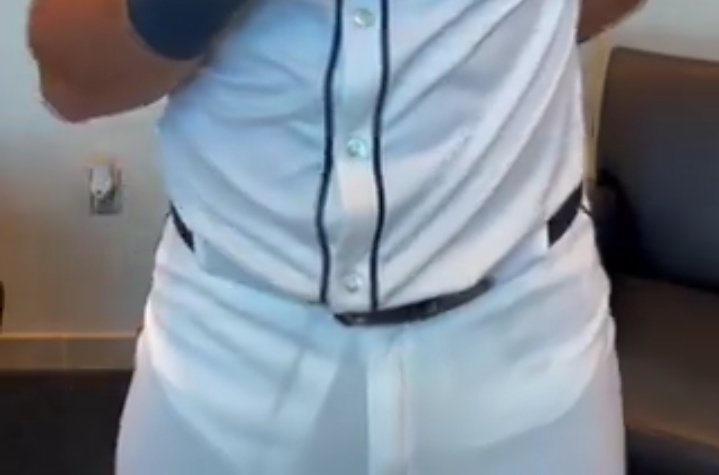 Cal Raleigh, Mariners catcher shows off his jersey in a video on social media. 