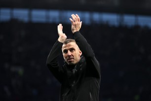 Gary O'Neil, Manager of Wolverhampton Wanderers celebrates victory with the fans during the Premier League match between Tottenham Hotspur and Wolverhampton Wanderers.