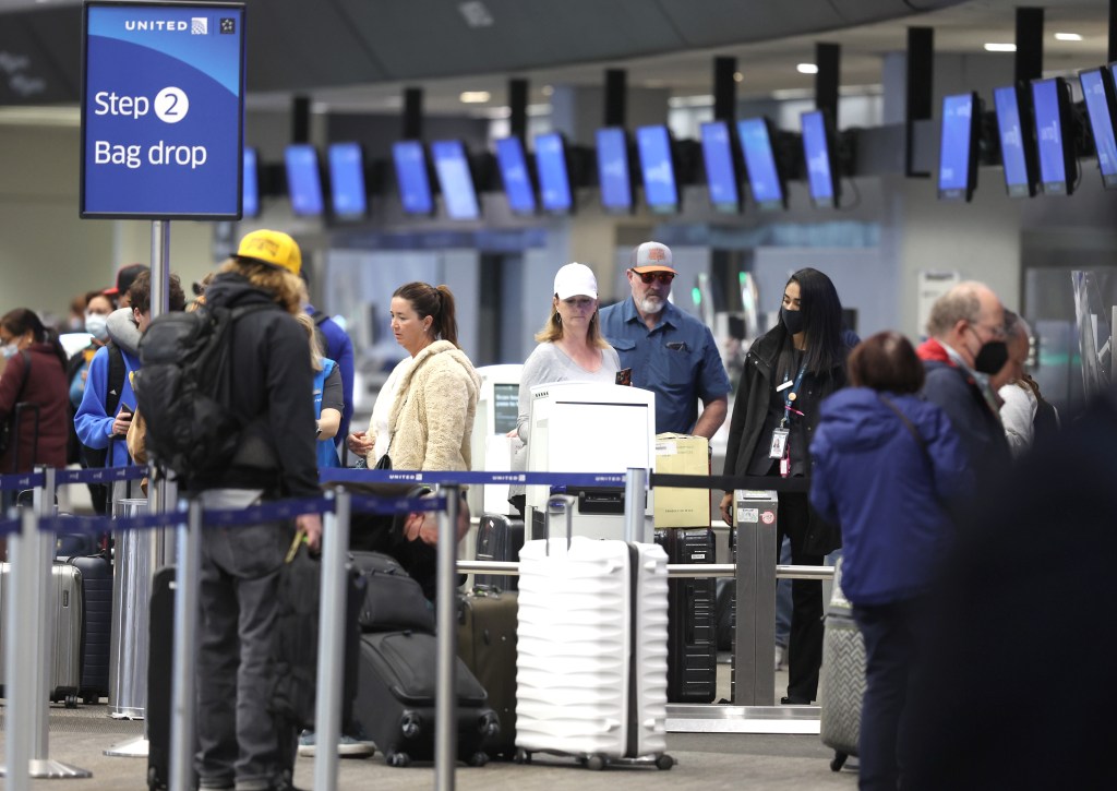 Checking bags at the airport is becoming more expensive than doing it ahead of time.