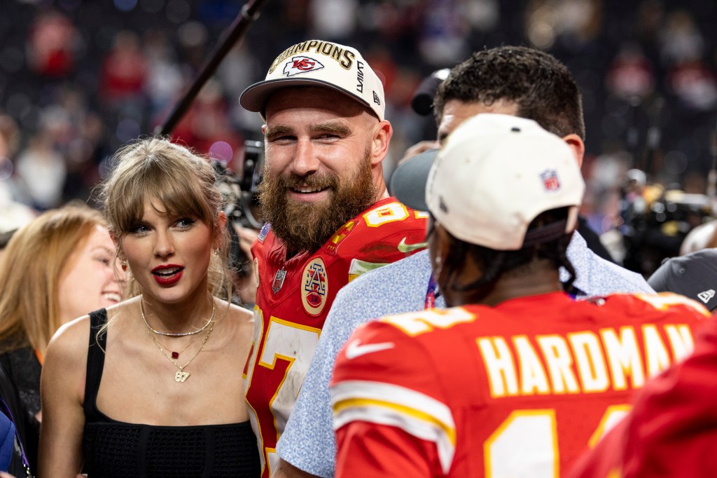 Travis Kelce and Taylor Swift react as they see Mecole Hardman Jr, who caught the game-winning touchdown in the 25-22 Super Bowl victory.