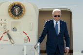 President Joe Biden walks down the stairs of Air Force One upon landing at JFK airport in Queens, NY.