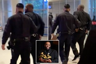 Killer Mike led away in handcuffs