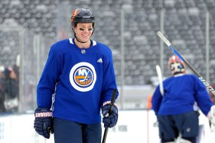 A smiling Matt Martin skates during the Islanders' practice at MetLife Stadium on Thursday.