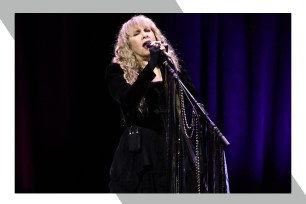 Stevie Nicks belts her heart out into a microphone.