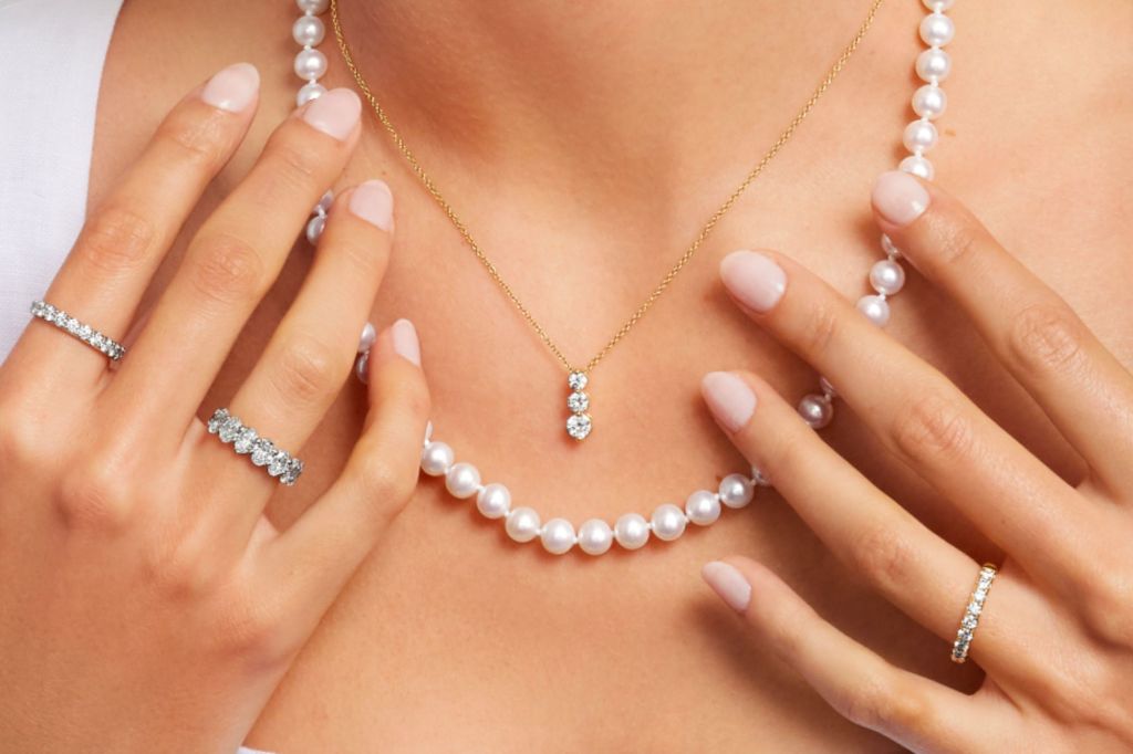 Best Valentine's Day Gifts for 2024 - a woman wearing a necklace and ring.