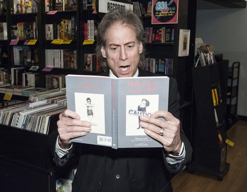 Richard Lewis poses for a photograph at the signing of his novel "Reflections From Hell" at Book Soup in 2015.
