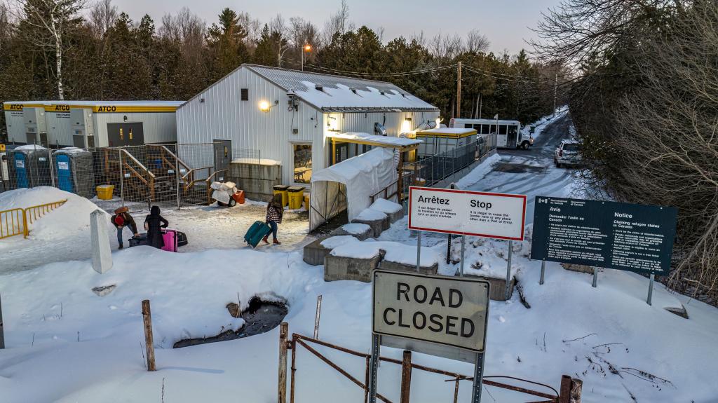 Migrants from Venezuela, Nigeria, Haïti and other countries arriving at the Roxham Road border crossing in Roxham, Quebec, on March 3, 2023.