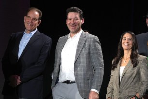 CBS Sports play-by-play announcer Jim Nantz (left), analyst Tony Romo (center) and sideline reporter Tracy Wolfson .