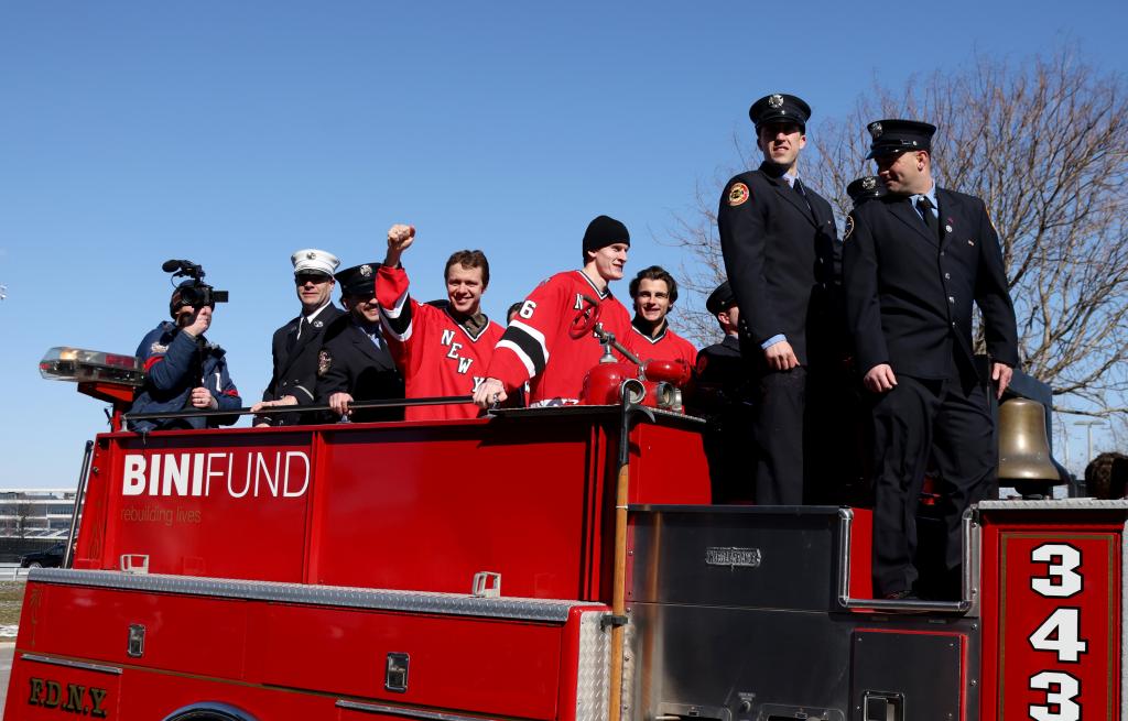 Artemi Panarin gives a thumbs-up from an FDNY truck.