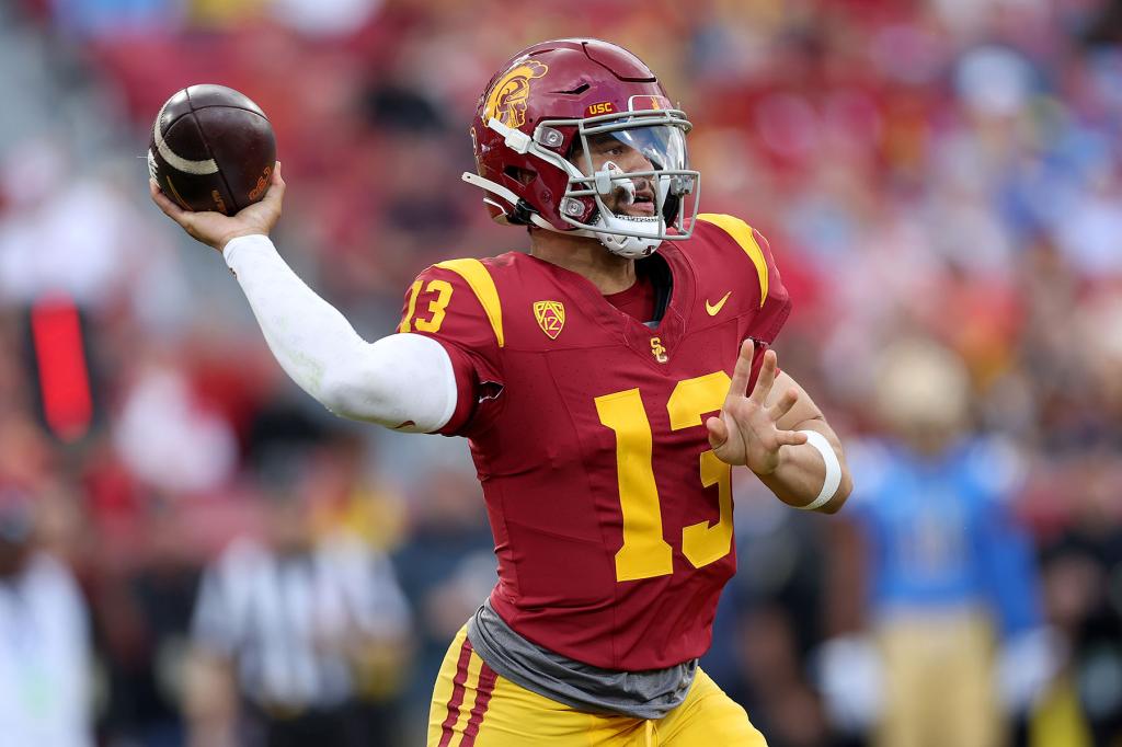 Caleb Williams #13 of the USC Trojans passes the ball during the first half of a game against the UCLA Bruins at United Airlines Field at the Los Angeles Memorial Coliseum on November 18, 2023 in Los Angeles, California. 
