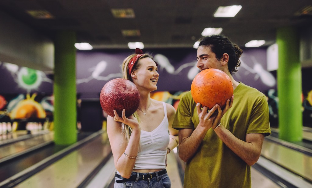 Some men get offended when women over to split the cost of date activities. Stock image. 