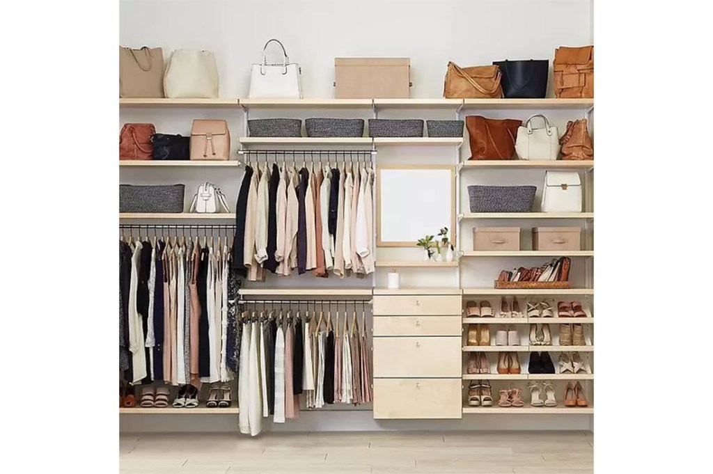 A closet with many shelves and clothes.