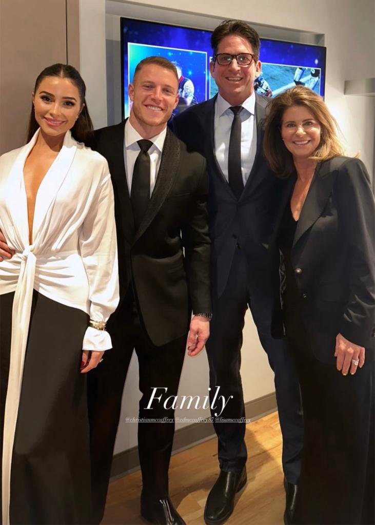 Olivia Culpo and Christian McCaffrey with his parents, Ed and Lisa McCaffrey at NFL Honors in Las Vegas on Feb. 8, 2024.